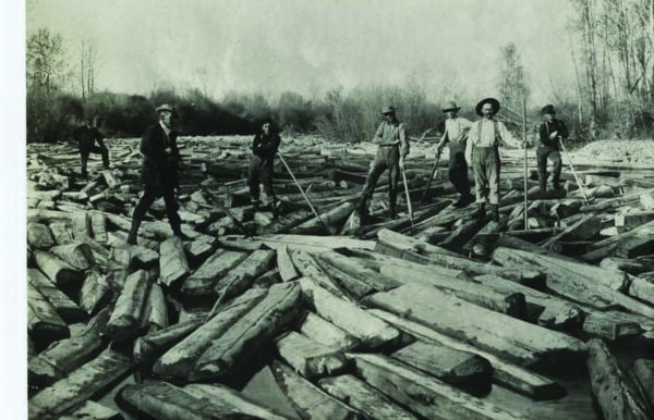 Breaking a log jam on the Gallatin. Photograph courtesy of Historic Crail Ranch Museum